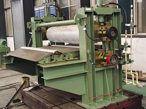 Outlet shear pinch roller